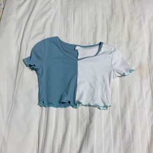 I’m selling a white and blue/teal crop top
